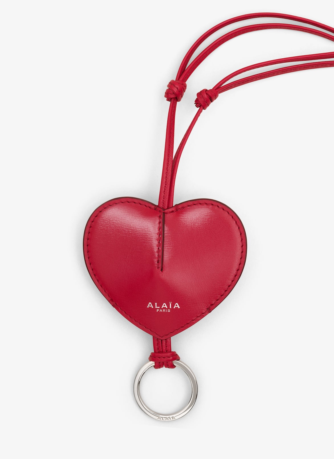 쾨르 송아지 가죽 슬링백 ALAÏA 래커 레드 쾨르 송아지 가죽 슬링백